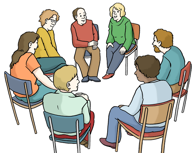 Eine Gruppe von Menschen sitzt in einem Stuhl-Kreis und diskutiert miteinander.