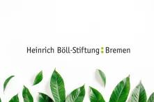 Heinrich Böll-Stiftung Bremen auf weißem Hintergrund unten grüne Blätter im Bild