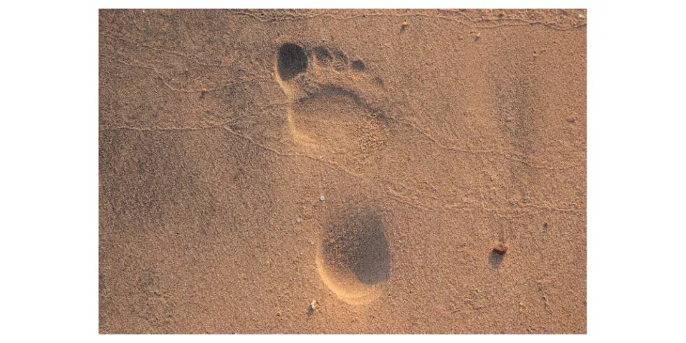Fußabdruck im Sand